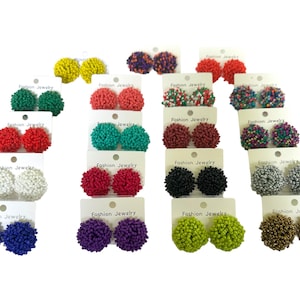 May include: Assortment of colorful beaded earrings. The earrings are displayed on white cards with the text "Fashion Jewelry".