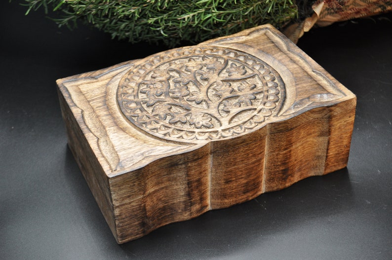 large carved wooden box