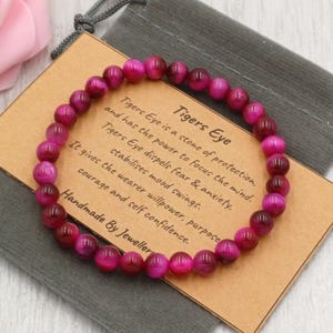 Bracelet ŒIL DE TIGRE MAGENTA extensible fait main avec sac cadeau et carte en cristal de 6 mm