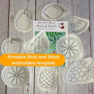 Könnte beinhalten: Druckbare Stickvorlagen mit verschiedenen Früchten, darunter eine Birne, eine Zitrone, eine Wassermelone, ein Apfel, Kirschen, eine Orange, eine Ananas und Trauben. Die Vorlagen sind auf wasserlöslichem Stabilisator gedruckt und mit "Tales Of A Thread Stick & Stitch" beschriftet.