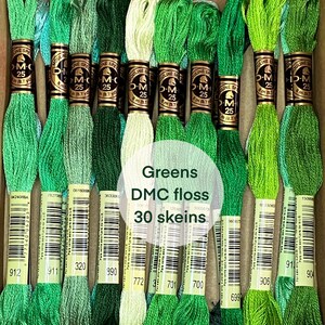 May include: A collection of 30 skeins of DMC green floss in various shades, from light to dark. The image includes the text "Greens DMC floss 30 skeins". Each skein is labeled with a number and has a gold and black label.