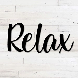 May include: Black metal wall decor with the word "Relax" written in a cursive font.