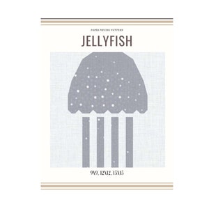 Könnte beinhalten: Papier-Patchwork-Muster für eine graue Qualle mit weißen Punkten. Das Muster umfasst die Größen 9x9, 12x12 und 15x15 Zoll.