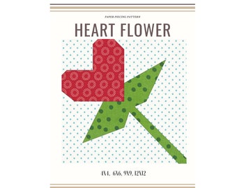 May include: Paper piecing pattern for a heart flower. The pattern is for sizes 4x4, 6x6, 9x9, and 12x12 inches.