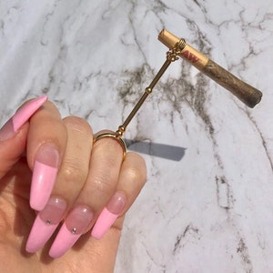 Aunt Zelda S Cigarette Holder Ring From The Chilling Etsy Find cigarette holder costume halloween shopping results from amazon & compare prices with other halloween online stores: aunt zelda s cigarette holder ring from