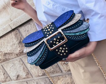 broad belt sling bag