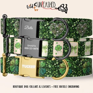 May include: Three green dog collars with shamrock and heart patterns. The top collar has the name "Bella" engraved on the buckle. The middle collar has "Shasta" and a phone number. The bottom collar has "Tucker" engraved. The collars have black and gold hardware.