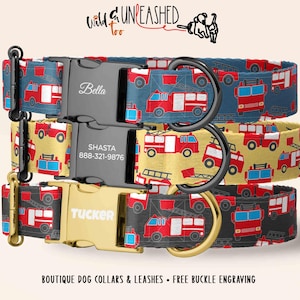 May include: Three dog collars with fire truck patterns in blue, yellow, and black. Each collar has a metal buckle with a name engraved on it. The top collar says "Bella", the middle collar says "Shasta" and the bottom collar says "Tucker".