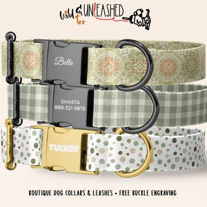 May include: Three dog collars with personalized buckles. The top collar has a floral pattern in green and red. The middle collar is a green gingham pattern. The bottom collar has a white background with green and tan polka dots. The buckles are engraved with names and a phone number.