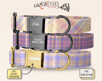 May include: Three dog collars featuring pastel plaid patterns in shades of purple, yellow, and orange. Each collar has a metal side-release buckle with custom engraving. The top two buckles are black, and the bottom buckle is gold-toned metal.
