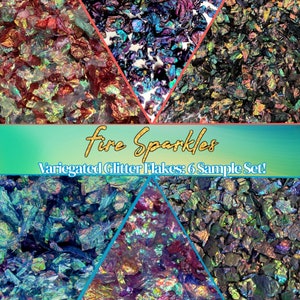 May include: Six samples of iridescent glitter flakes in a variety of colors, including red, blue, green, and purple. The glitter flakes are arranged in a hexagonal pattern and are labeled "Fire Sparkles Variagated Glitter Flakes: 6 Sample Set!"