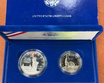 Juego de monedas de plata de prueba de la Estatua de la Libertad y medio dólar revestido de la Casa de la Moneda de EE. UU. (1886-1986)
