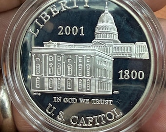 Dólar de plata al 90% conmemorativo del Centro de Visitantes del Capitolio de los Estados Unidos de 2001