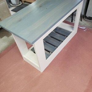 24 inch entry bench and shoe holder! Handmade featuring 1 shelf. Your choice of stain and paint colors. Primary-Base Secondary-Top!