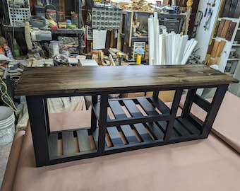 46 inch entryway bench! Featuring 2 shoe shelves and 2 boot cubby's. Your choice of stain and paint colors. Primary=Base Secondary=Top
