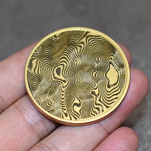 Haptic Brass Coin