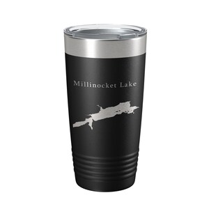 May include: Black stainless steel tumbler with a white outline of the shape of Millinocket Lake and the text "Millinocket Lake".