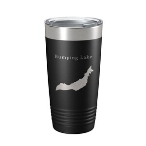 May include: A black stainless steel tumbler with a silver lid. The tumbler has a white outline of Bumping Lake and the text "Bumping Lake" on the side.