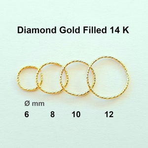 Orecchino a cerchio riempito in oro con diamanti, orecchino Helix.