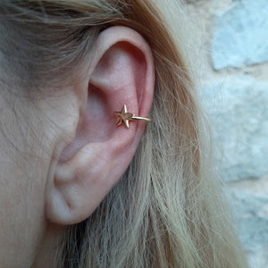 Star ear cuff earring.