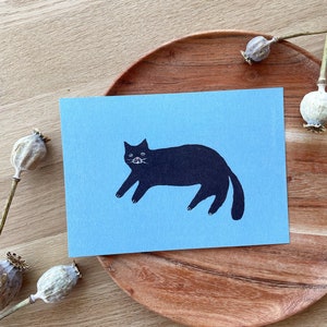 Black cat as postcard, cat motif