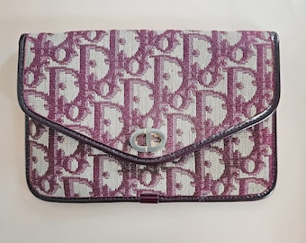 Vintage Christian Dior Diorissimo Red Clutch: Elegant Evening Bag for Luxury Fashion Enthusiasts