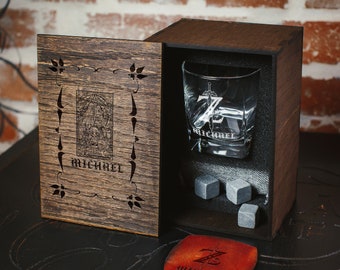 May include: A wooden box with a glass and ice stones inside. The box is engraved with the name "Michael" and a design. The glass is also engraved with the name "Michael" and a design.