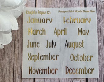 Miniplanificador diario con pegatinas horizontales laminadas para mes, tamaño pasaporte, fuente minimalista simple