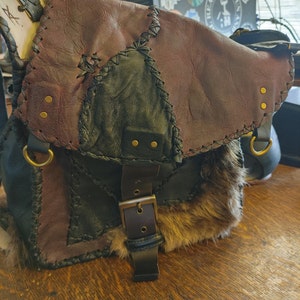 Wilderness Luxe - Cartera premium de piel de castor
