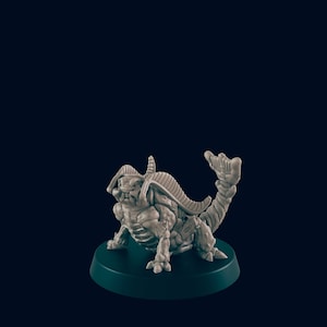 May include: A detailed, grey, 3D printed miniature of a creature with a segmented body, four legs, and a long, curled tail. The creature has a large head with a toothy mouth and a pair of horns.