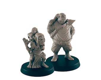 May include: Two painted miniature figurines of goblins. The goblin on the left is carrying a sack on its back and holding a small axe. The goblin on the right is wearing a tunic and carrying a bag over its shoulder.