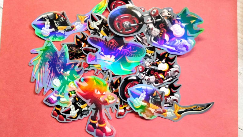 Glossy and holographic Shadow the Hedgehog stickers. Shadow with emerald sticker. Shadow motorcycle sticker.
Shadow loves latinas sticker.
Shadow as lancelot sticker.
Shadow dark wings sticker. Sonic x shadow generations.
