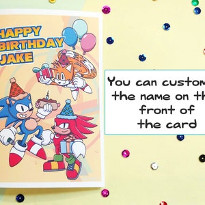 sonic birthday card with sonic, tails, and knuckles. Card says "Happy Birthday Jake" on front. Name on front of card is customizable.