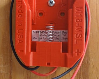 Strömdocka för Milwaukee M18 18V-batteri - Automatisk utkastningsfjäder - 14AWG-ledningar Art.nr: M18-PD-14AE