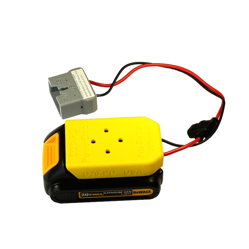 May include: A yellow and black DeWalt 20V MAX lithium-ion battery with a yellow adapter and a black and red wire.