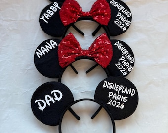 Diadema personalizada a juego con orejas de Minnie Mouse y lazo de Mickey para viaje familiar a Disneyland París Disney World 2026