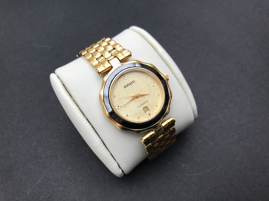 Vintage Ladies RADO Florence 22mm Round Face Black and Gold
