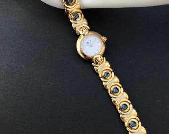 Vintage Monet Gold Tone and Sapphire Glass Bracelet Watch, Working