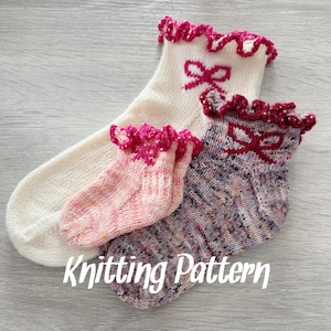 May include: Two pairs of knitted socks with pink bows and ruffled edges. The socks are in different colors and patterns. One pair is white with a pink bow, and the other pair is a multi-colored yarn with a pink bow. The text "Knitting Pattern" is visible at the bottom of the image.