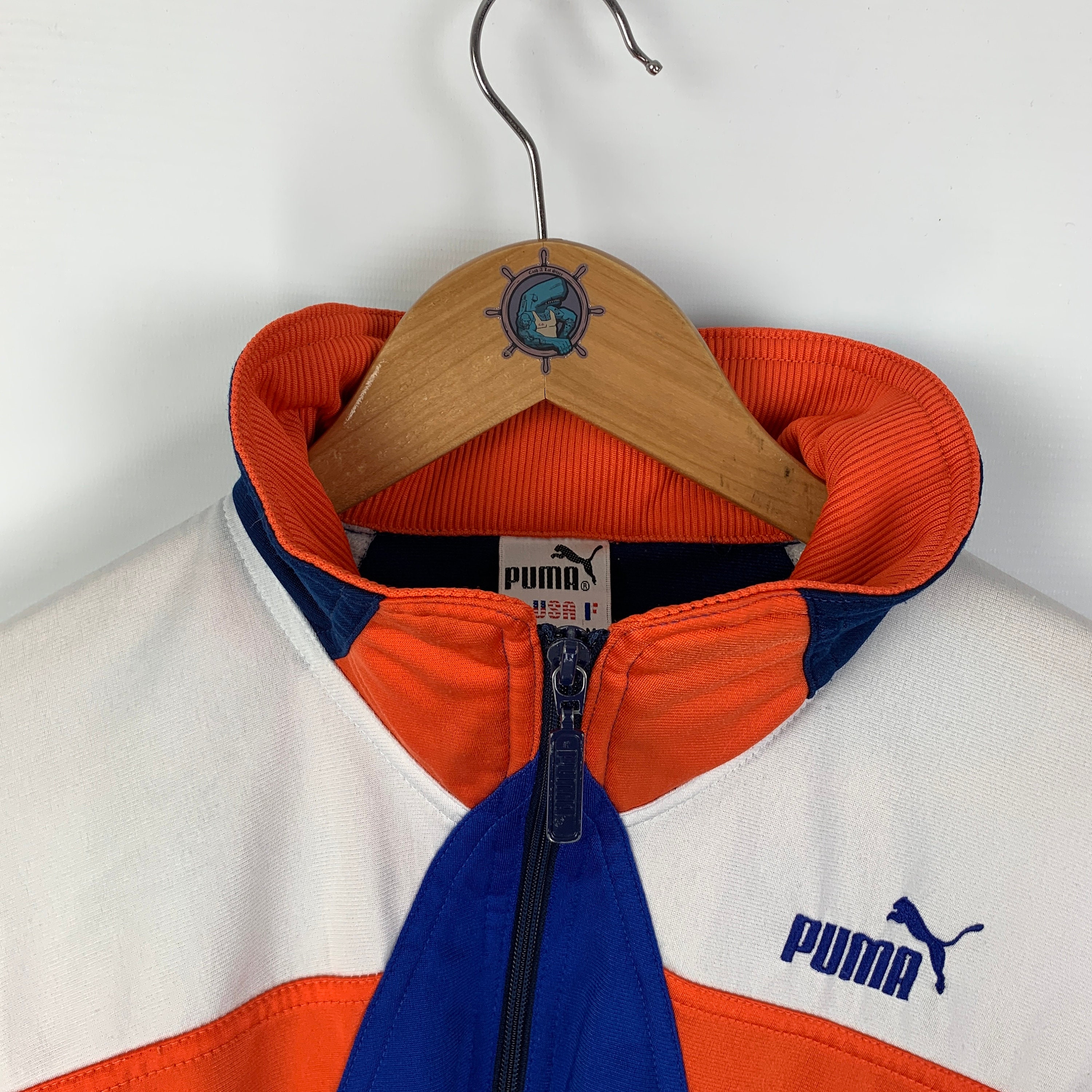 Orange store puma jacket