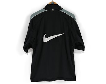 90er Jahre Vintage Herren NIKE Back Swoosh schwarze Kurzarm-Trainingsjacke Größe M Retro-Sportbekleidung