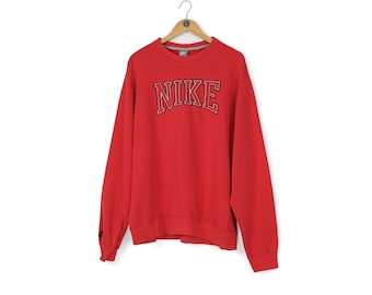 Vintage NIKE-logotyp i mitten, röd rund halsringning, storlek L XL, enkel tröja i sportig stil