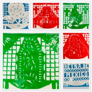 May include: A set of six colorful paper banners with intricate cut-out designs. The banners feature a variety of patterns, including flowers, geometric shapes, and a design that says "REYNADE MEXICO".