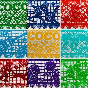 May include: Nine colorful papel picado banners with various designs and the word "COCO". Each banner features intricate cut-out patterns, including guitars, floral elements, and figures, in shades of green, blue, red, yellow, and purple.