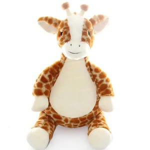 May include: A plush giraffe toy with a white belly, white face stripe, and brown spots. The stuffed animal has small ears, two small horns, and is sitting upright. The giraffe is made of soft, fuzzy material.