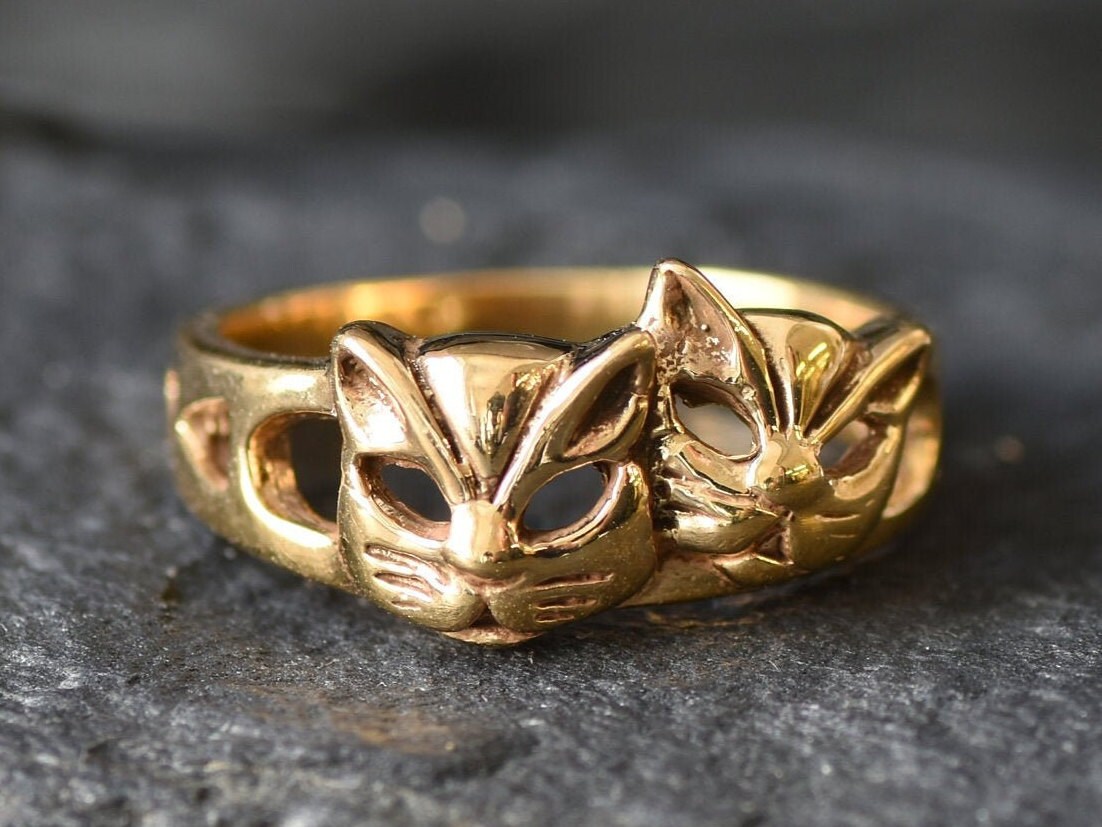 Anillo de gato de oro sales