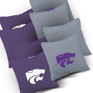 May include: Set of eight bean bags in purple and gray with a white and purple Wildcat logo. The bean bags are perfect for playing cornhole or other games.