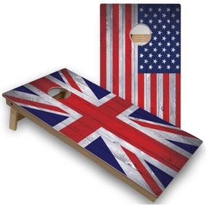 May include: Two wooden cornhole boards with a distressed wood look. One board features the Union Jack flag and the other features the American flag.