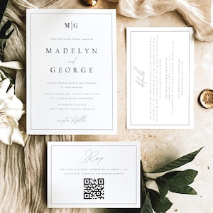 May include: White wedding invitation suite with black text. The main invitation card features the couple's names, "Madelyn and George", and the date and time of the wedding. The RSVP card includes a QR code for guests to respond.