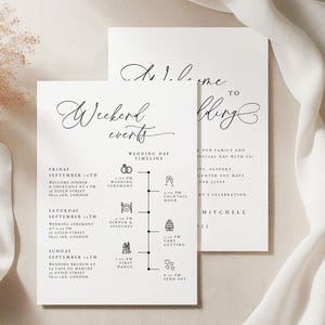 May include: Two white wedding invitation cards with black calligraphy text. One card reads "Weekend Events" and details a wedding timeline. The other card says "Welcome to Wedding". The cards are on a white background.